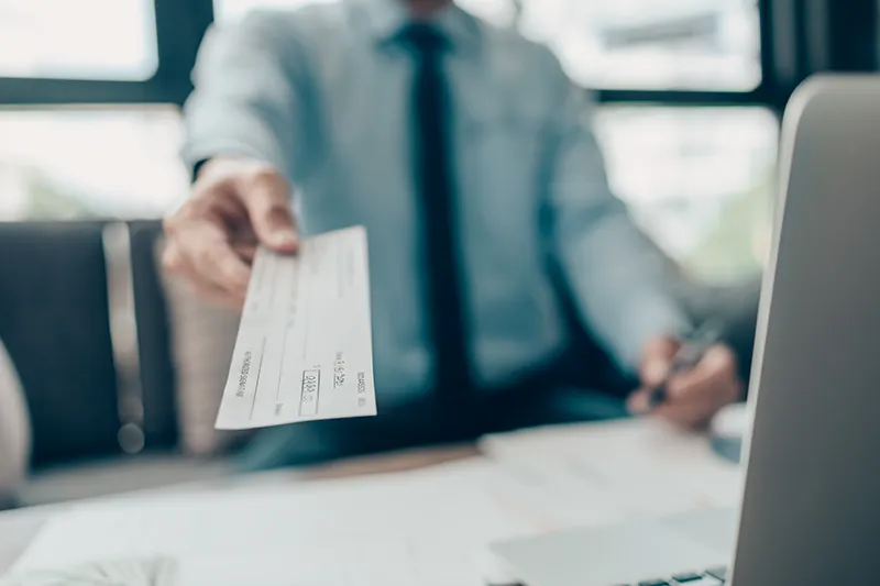 Getting handed a check