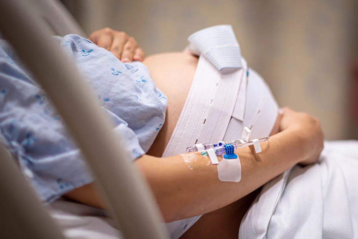 Woman in labor having a baby